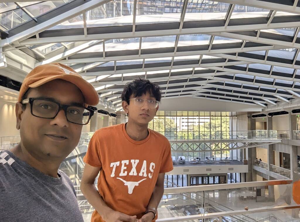 Dad and son in a college building of UT Austin